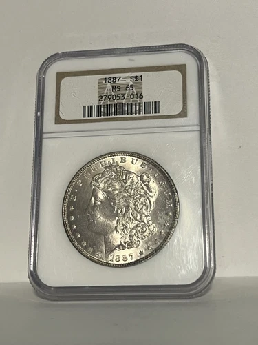 1887 Morgan Silver Dollar  NGC MS65  ~~ light rose gold Tone on front