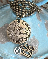 Beautiful BE KIND Etched Bronze Necklace. Love.