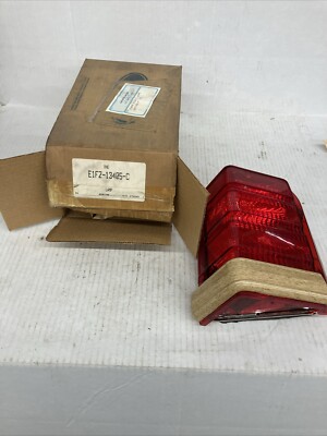 1984-1988 Ford Escort Squire  Wagon OEM Driver Side Tail Lamp Lens E1FZ-13405-C