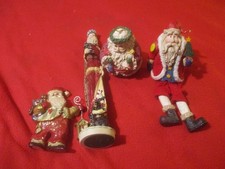 Lot of 4 Vintage Resin Santa Claus Christmas Figurines