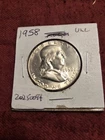 1958P BEN FRANKLIN SILVER HALF DOLLAR IN ALMOST UNCIRCULATED; .90 SILVER