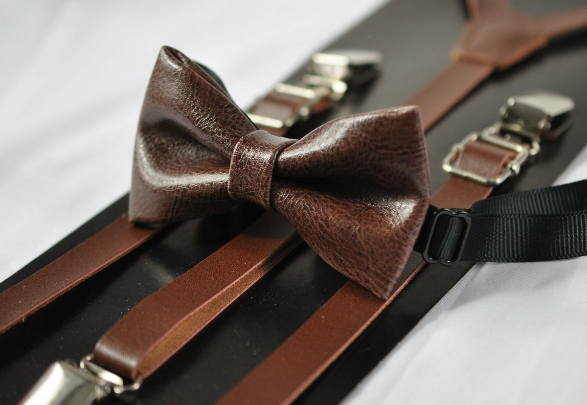 brown braces and bow tie