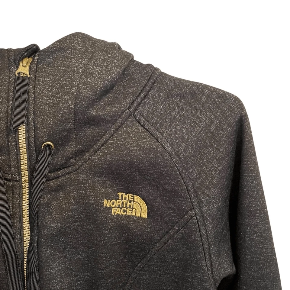 Sudadera con Capucha The North Face Negra Dorada Cremallera Completa Forrada de Vellón Talla S/P Foto 2 de 4