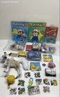 Collection of Pokemon Toys and Accessories