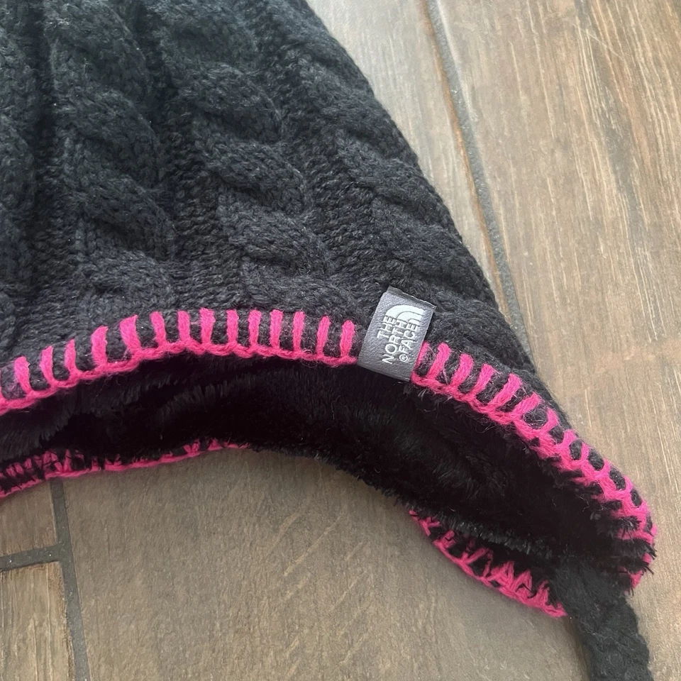Gorro difuso The North Face para niñas talla pequeña negro/rosa con pompón Foto 2 de 4
