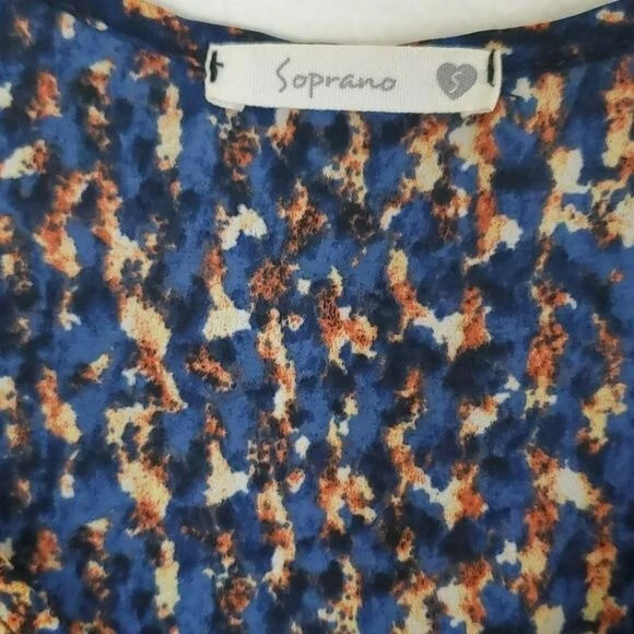 Top soprano alto bajo, azul, naranja, negro, estampado crema sin mangas S Foto 4 de 4