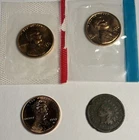 Mixed lot of 4 United States one cent coins. 1867 Indian head, 2009-d Lincoln