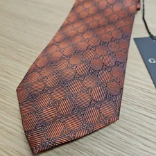 with tag GUCCI tie 100% silk Orange GG pattern All pattern