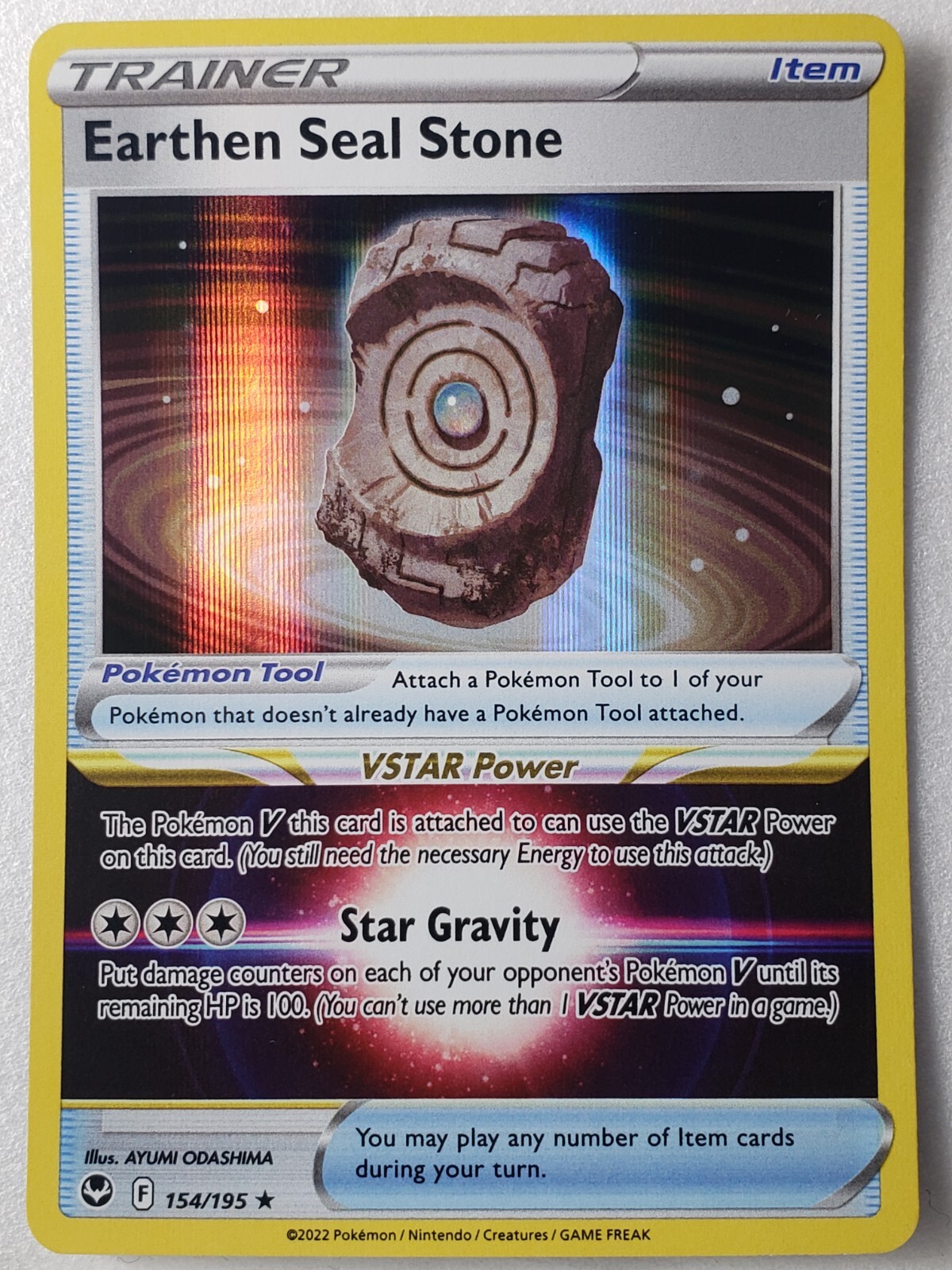 HOLO Earthen Seal Stone 154/195 NM - Silver Tempest Sword Shield Pokemon Card
