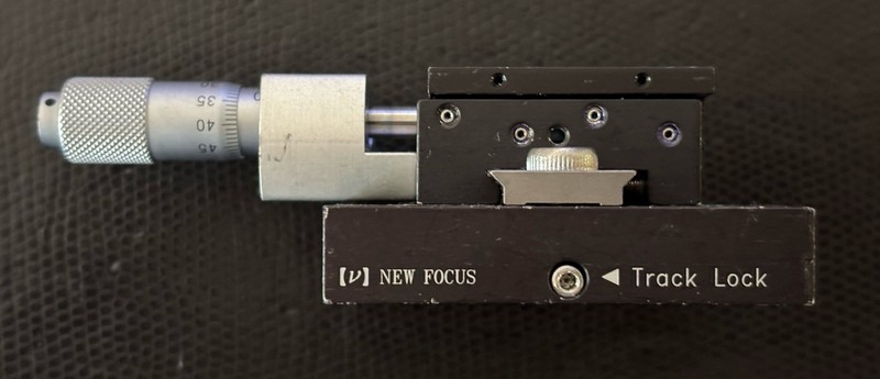 Newport / New Focus 9065-X Manual Linear Stage; Triple Divide, 0.55”
