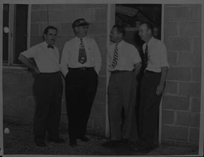 Champion Spark Plug group members Dr Smith, Wilbur Shaw, Al Bl 1949 Indy Photo