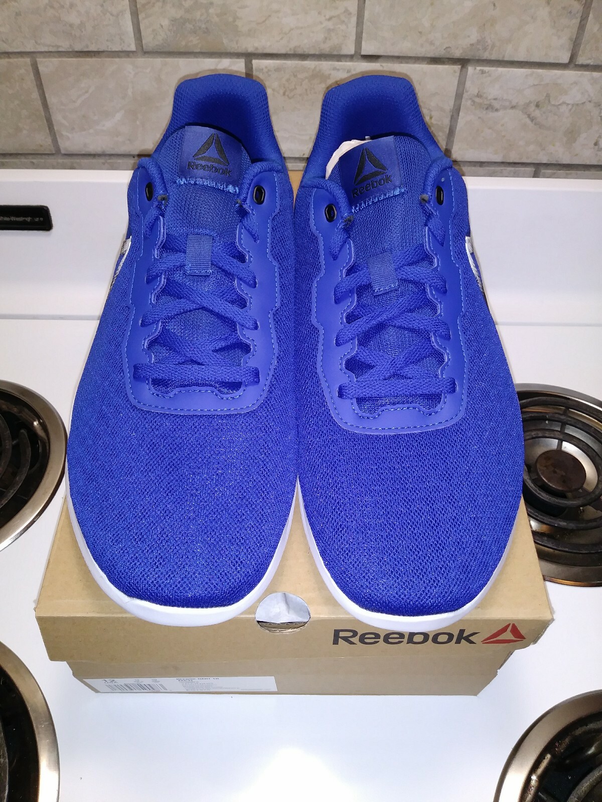 reebok men's dart shoes shoes