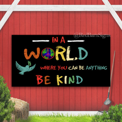 Be Kind In A World Where You Can Be Anything indoor outdoor banner sign