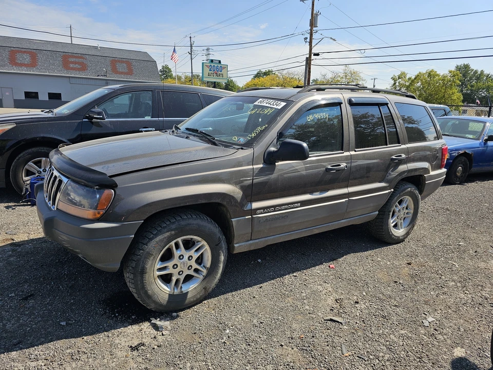 Conjunto de faros izquierdos usados se adapta a: Jeep Grand Cherokee 1999 tinte humo trasero oscuro Foto 4 de 4