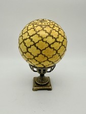 Yellow Shpere With Brown Geometric Design On Metal Base