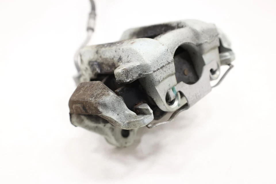Pinza de freno de disco trasera izquierda Dodge Durango 2011-2026 OEM Foto 3 de 4