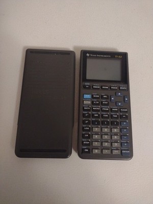 Texas Instruments T1-82 Graphing Calculator Pre owned No Cover Tested