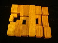 Wooden Puzzle Brain Teaser - Triple Cross - Puzzle Master Inc.