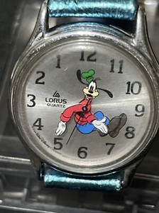 #727-VINTAGE LORUS BACKWARDS GOOFY WATCH V516-6A00 A1 SILVER  TONE W/NEW BATT.