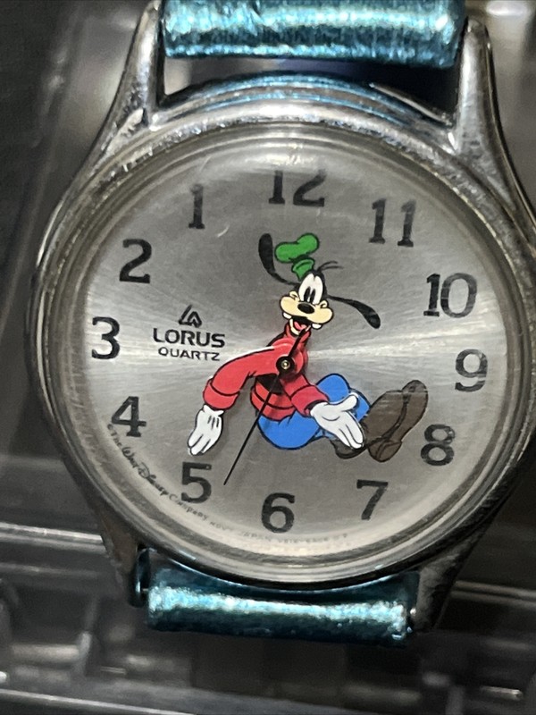 #727-VINTAGE LORUS BACKWARDS GOOFY WATCH V516-6A00 A1 SILVER  TONE W/NEW BATT.