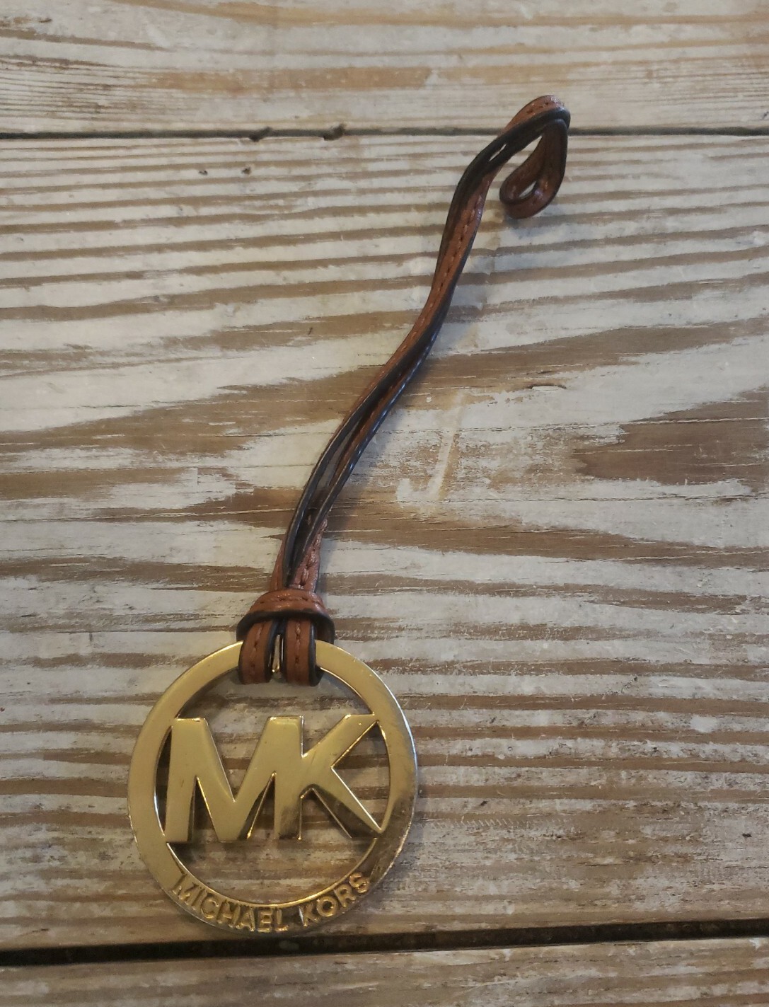 michael kors gold hang tag