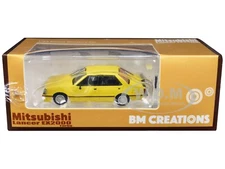 MITSUBISHI LANCER EX2000 TURBO YELLOW W/EXTRA WHEELS 1/64 BM CREATIONS 64B0213