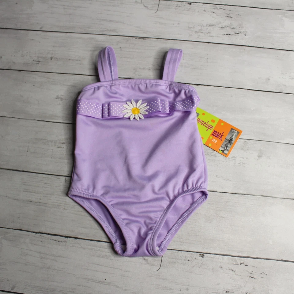 Penelope Mack Baby Mädchen 1-teiliger Badeanzug Größe 18 Monate lila Gänseblümchen