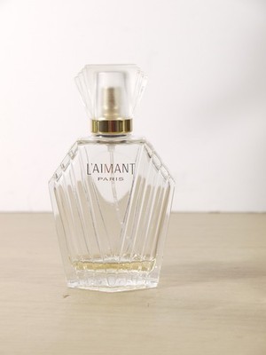 L'aimant Eau De Toilette von Coty für Damen 50 ml Leerflakon