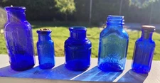 Lot of 5 vintage cobalt blue glass bottles Great Collection 1890-early century.