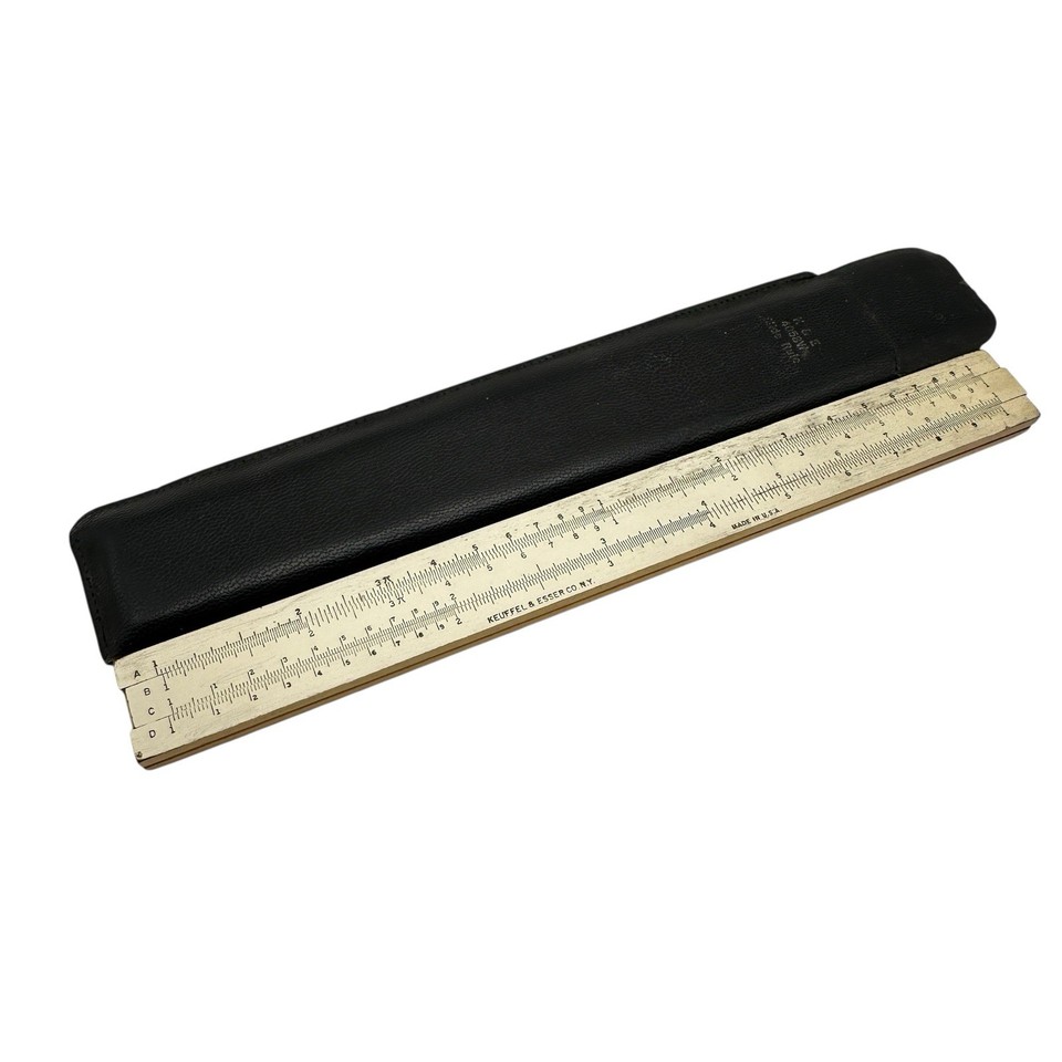 Keuffel & Esser is the *Rolls-Royce* of slide rules — this K&E branded piece is a genuine piece of American scientific instrument heritage.