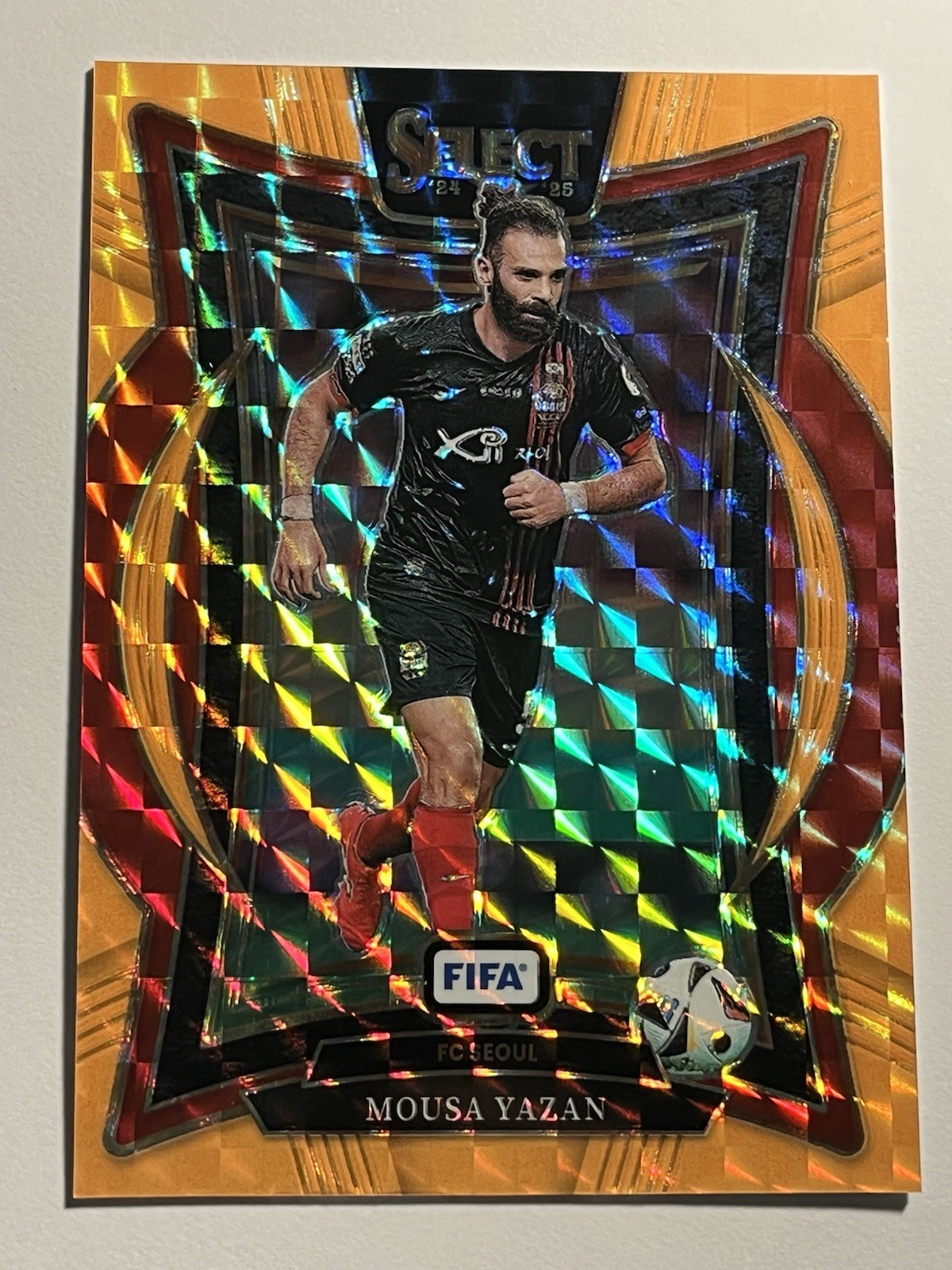 2024-25 Panini Select FIFA Mousa Yazan ORANGE Fluorescent Prizm #/125 FC Seoul