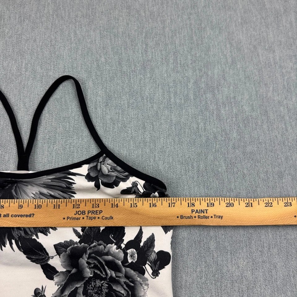 Camiseta sin mangas Lululemon para mujer 10 negra blanca enérgica floración Power Y atlética yoga gimnasio Foto 3 de 4