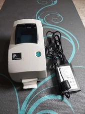 Zebra TLP2824-Z Compact Thermal Transfer Label Printer. working