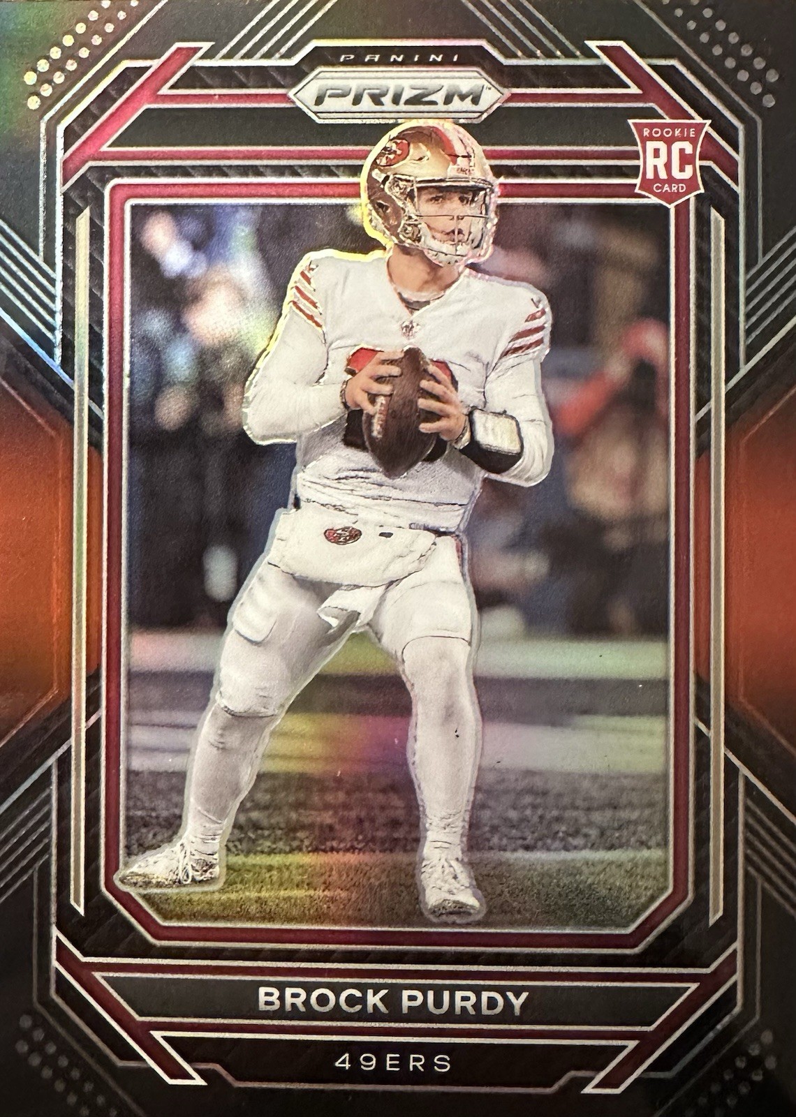 2022 Panini Chronicles - Prizm Black Brock Purdy #PB-8 Red /99 (RC)