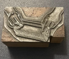 Hands working with roller | vintage letterpress printing block