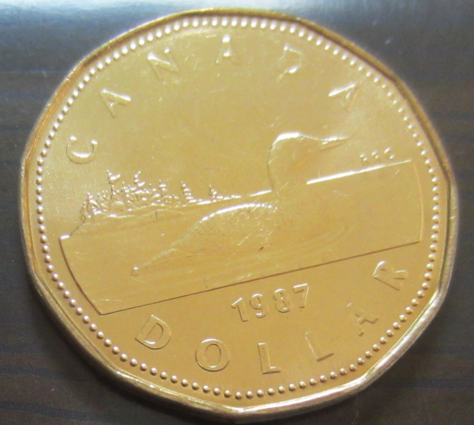 1987 Canada One Dollar Coin. (UNC. Canadian Loonie 1 $)