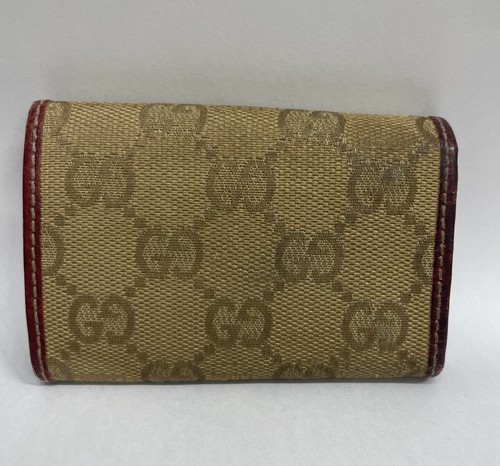 Auténtico estuche para llaves Gucci GG lona beige cinta cuero rojo - Imagen 5 de 18