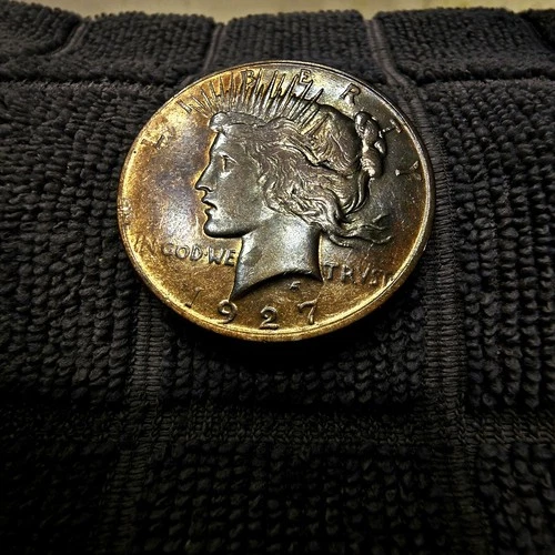 1927 Peace Silver Dollar $1 Uncirculated AU++, Toned