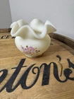 vintage Fenton custard glass rose bowl with a ruffled, crimped edge.
