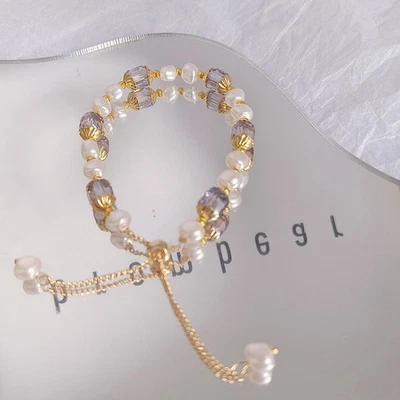 Bracelet réglable violet pour cristal et perle longueur 19 cm motif perle blanc - Photo 1/4