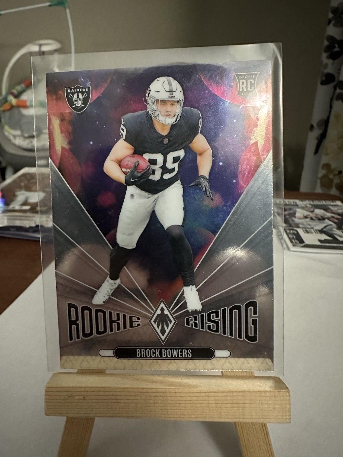 2024 Panini Phoenix - Rookie Rising Brock Bowers Cosmic Silver #RR-BBS (RC)
