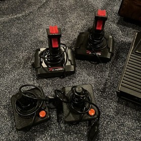 Atari 2600 Console With 16 Games, 4 Joysticks And 2 Paddles + Game Center