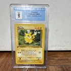 Pokémon TCG CGC 9 Pikachu 60/64 Jungle 1st Edition Regular 1999 English