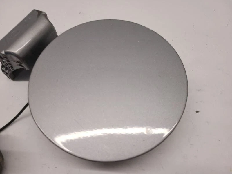 10 2011 11 2012 12 2013 13 2014 14 Hyundai Tucson 2010 puerta de llenado de combustible plateada Foto 4 de 4