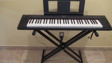 Clavier Yamaha portable noir support occasion comme indiqué et support score