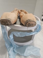used single pair of pointe shoes worn by professional ballerina