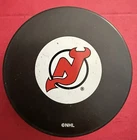 New Jersey Devils small Logo Official NHL souvenir puck perfect for autographs.