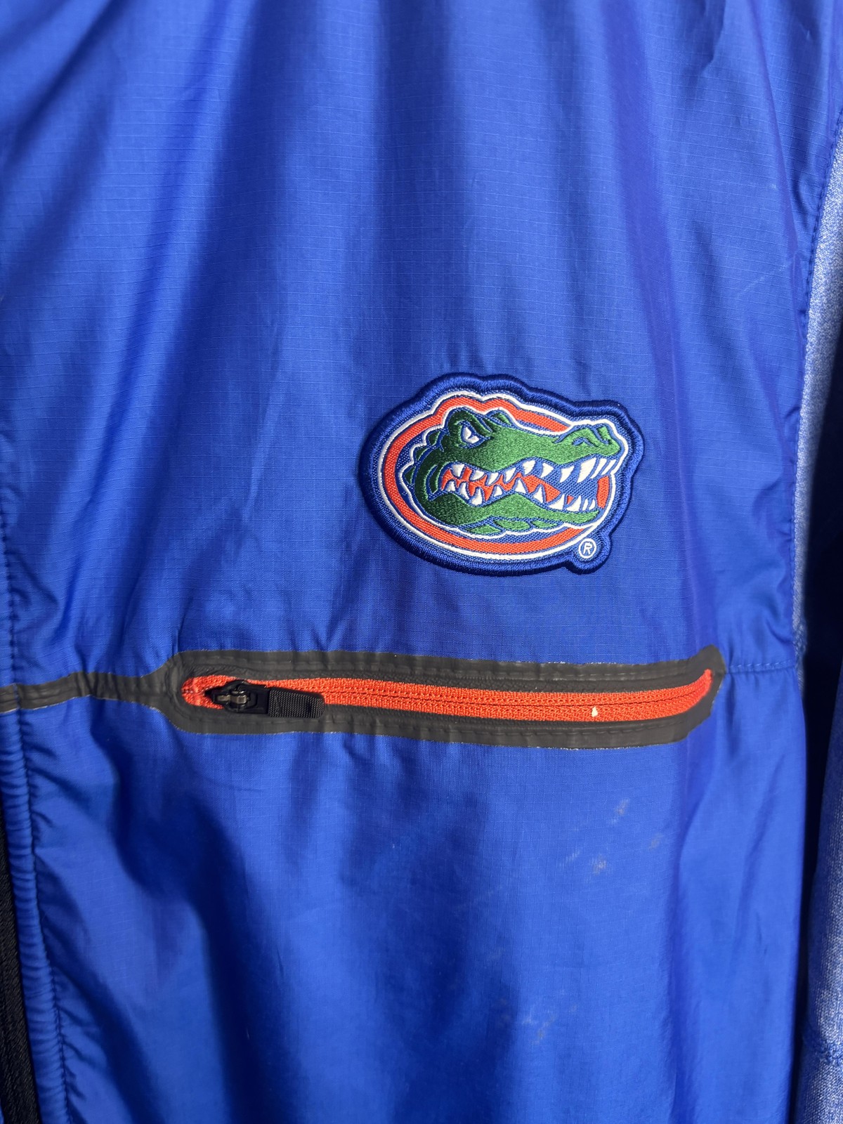 SACAI X NIKE Giacca a vento Florida Gators uomo blu medio NCAA calcio Nike Shield