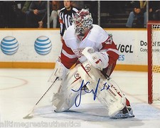 DETROIT RED WINGS JONAS GUSTAVSSON SIGNED 8X10 INCH PHOTO W/COA