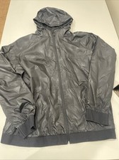 Sport Tek Embossed Hooded Wind Jacket Black XL